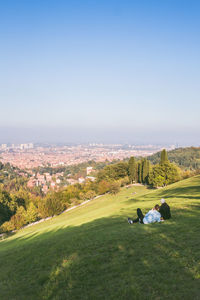 High angle view of golf course against clear sky