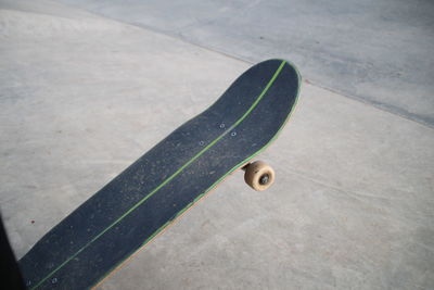 High angle view of skateboard on street