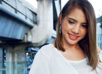 Portrait of a smiling young woman