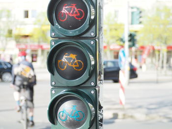 Low angle view of road signal in city