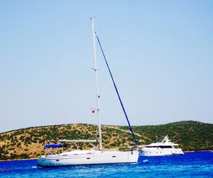 Sailboat sailing in sea