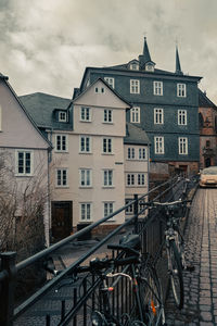 View of buildings against cloudy sky