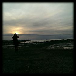 Scenic view of sea at sunset