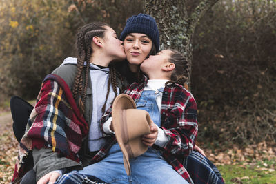 Young couple kissing outdoors