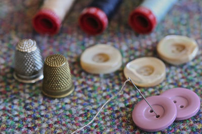 High angle view of various buttons on table