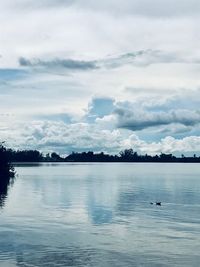 View of lake against cloudy sky