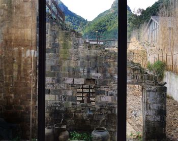Old building seen through window