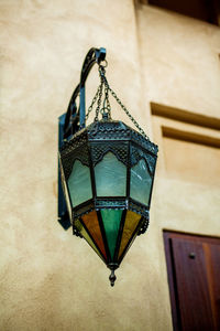 Low angle view of lantern hanging on ceiling