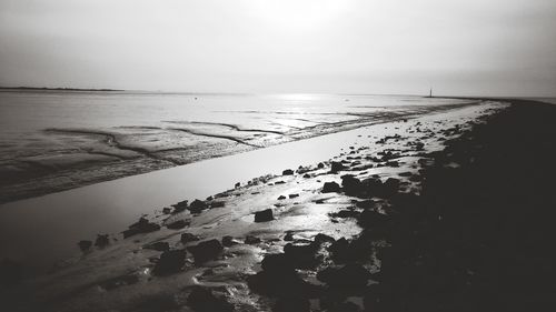 Scenic view of sea against sky at sunset