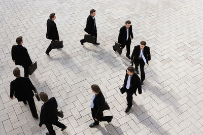 High angle view of people walking on street
