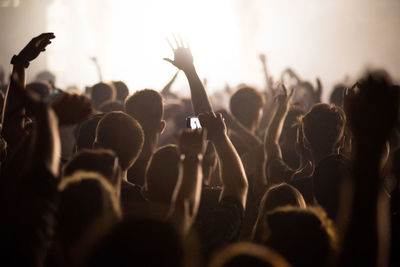 Crowd during music concert at night