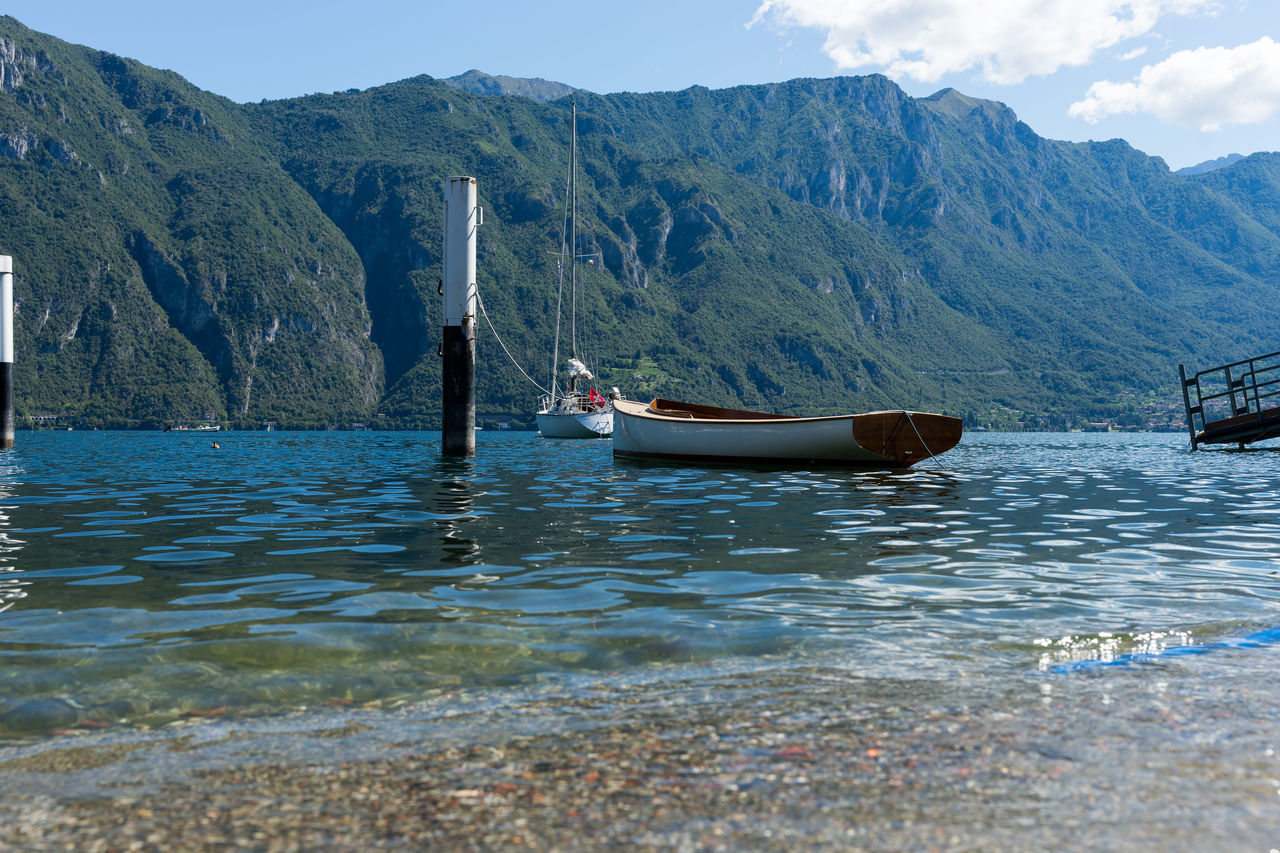 water, mountain, outdoors, lake, mountain range, nautical vessel, sky, day, nature, rescue, no people, beauty in nature