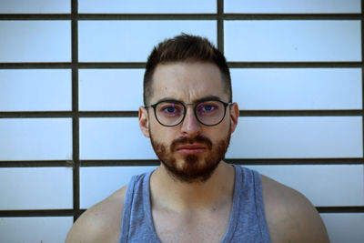 Portrait of young man wearing eyeglasses