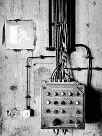 Close-up of electric lamp on wall