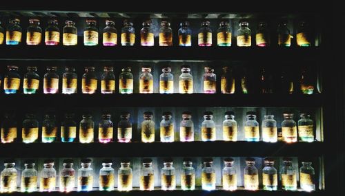 Full frame shot of multi colored bottles