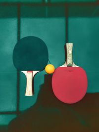 Close-up of ball on table against wall