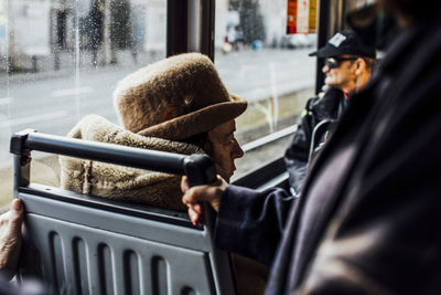 Rear view of people in bus