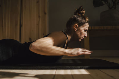 Woman exercising at home