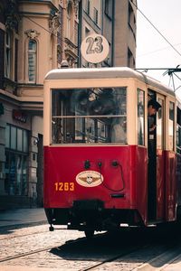 Train on railroad track in city
