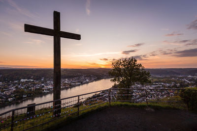 Cross against sky during sunset