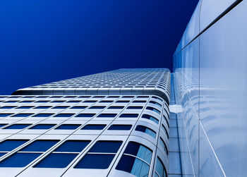 Low angle view of modern building against clear sky