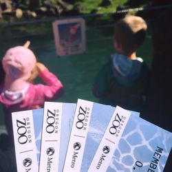 Rear view of people with text on table