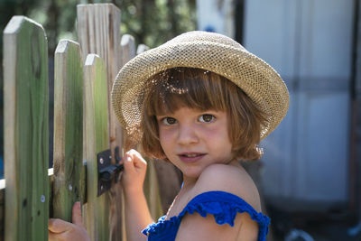 Portrait of cute girl wearing hat