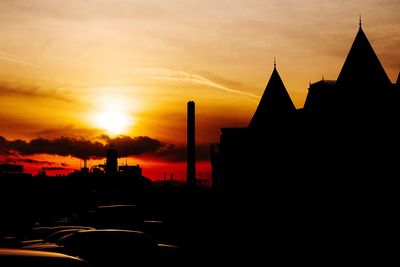 Silhouette of buildings at sunset