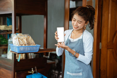 Young woman drinking coffee