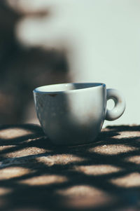 Close-up of coffee cup on table