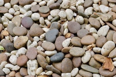 Full frame shot of pebbles on shore