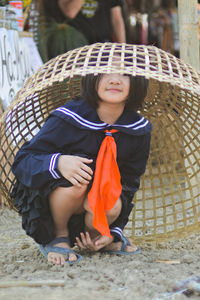 Full length of cute girl wearing hat