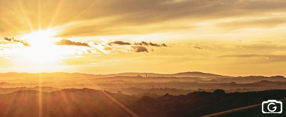 SUNSET OVER MOUNTAINS