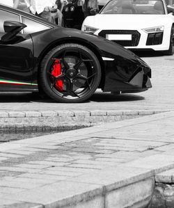 Close-up of vintage car on road