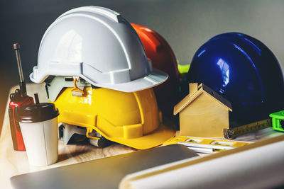 Close-up of yellow hat on table