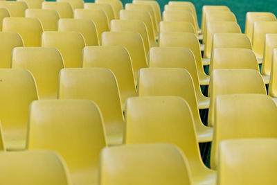 High angle view of yellow chairs