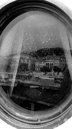 Close-up of wet glass window in rainy season