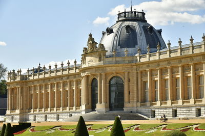 Facade of historic building against sky