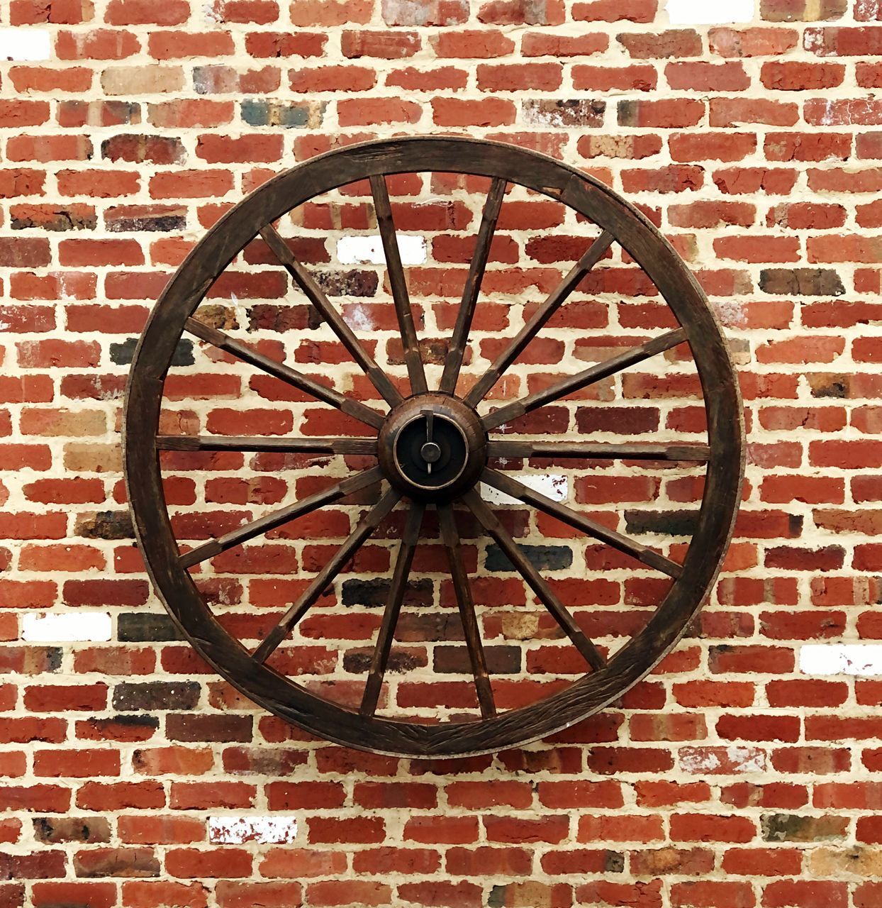 CLOSE-UP OF LIGHT BULB ON WALL