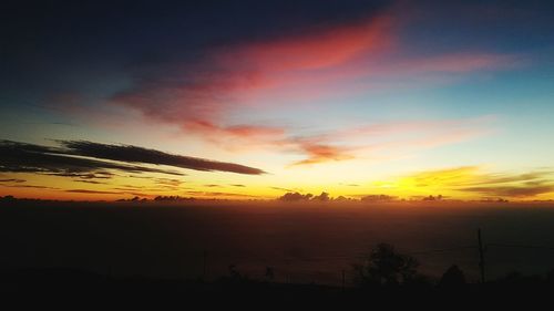 Scenic view of dramatic sky during sunset