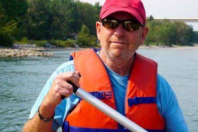 Portrait of man wearing life jacket