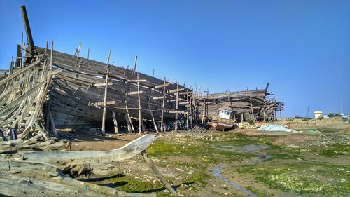 Abandoned construction site against clear sky