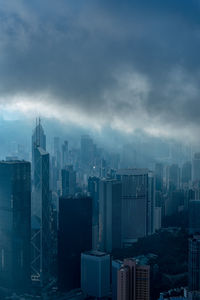 Modern buildings in city against sky