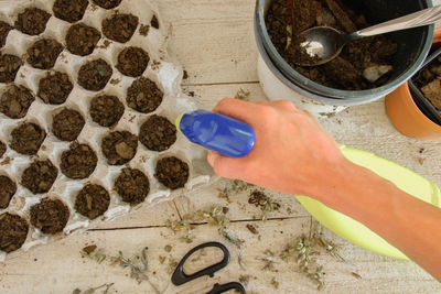 High angle view of person preparing food on floor