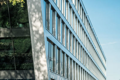 Low angle view of modern building against sky