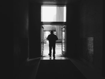 Full length of woman standing on wall