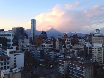 Cityscape against sky during sunset