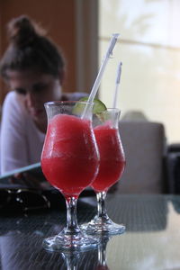 Close-up of red wine glass on table