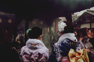 People standing at japanese temple