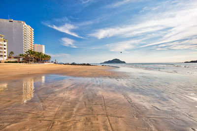 Scenic view of beach against sky